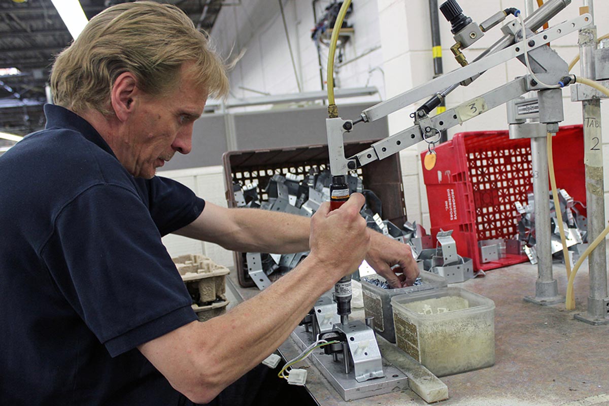 ELECTROLUX RELIES ON RISE WORKERS TO ASSEMBLE MORE THAN 6,000 COMPONENTS EACH DAY