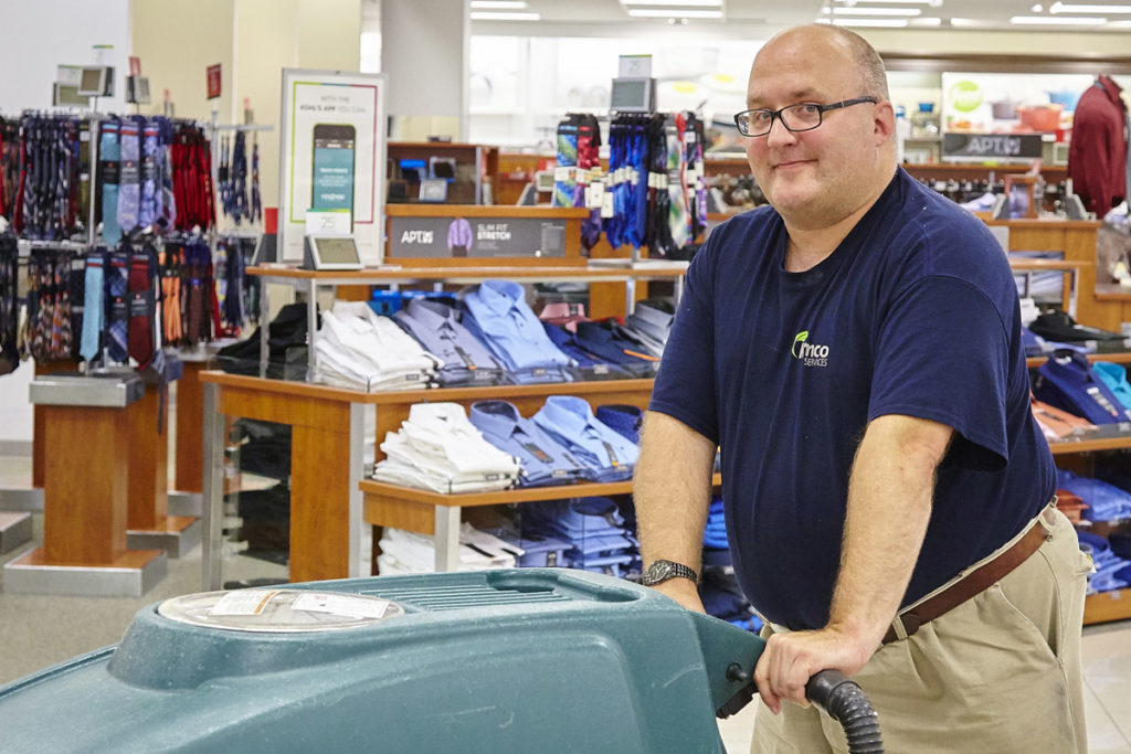 partner with rise to employ people with disabilities guy working at store