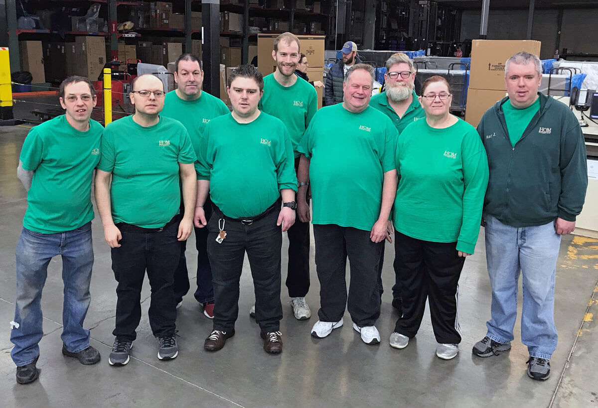 Rise team at  HOM Furniture recognized for the great work they do recycling  packaging  materials at  Coon Rapids warehouse